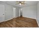 Bedroom featuring ceiling fan, hardwood flooring and fresh paint at 108 New Castle Ct, Youngsville, NC 27596