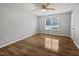 Bedroom featuring ceiling fan, hardwood flooring and fresh paint at 108 New Castle Ct, Youngsville, NC 27596