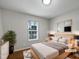 Cozy bedroom with a neutral color scheme, natural light, and comfortable furnishings at 108 New Castle Ct, Youngsville, NC 27596