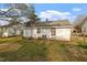 Home exterior, showcasing a lawn with lush grass and an air conditioning unit at 1103 Gaston St, Smithfield, NC 27577