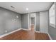 A spacious basement with a window, access to a closet and the laundry connections at 1103 Gaston St, Smithfield, NC 27577