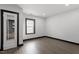 Bright bedroom featuring hard wood floors and access to a hallway at 1103 Gaston St, Smithfield, NC 27577