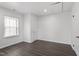 Comfortable bedroom featuring wood floors, a window and a closet door at 1103 Gaston St, Smithfield, NC 27577