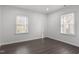 Cozy bedroom with two large windows offering plenty of natural light at 1103 Gaston St, Smithfield, NC 27577