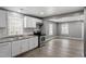 Bright kitchen featuring white cabinets, stainless steel appliances, and modern countertops at 1103 Gaston St, Smithfield, NC 27577