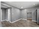 Open-concept living room showcasing neutral tones and ample natural light at 1103 Gaston St, Smithfield, NC 27577
