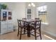 Cozy dining area bathed in natural light, perfect for enjoying casual meals with loved ones at 1176 Andrews Ct, Creedmoor, NC 27522