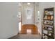 Welcoming foyer with gleaming hardwood floors leads into this beautiful home at 1176 Andrews Ct, Creedmoor, NC 27522