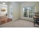 Inviting office space with natural light from large windows and comfortable space for working from home at 1176 Andrews Ct, Creedmoor, NC 27522