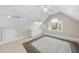 Finished attic space featuring built-ins, and a light fixture at 1301 Merrington Cir, Raleigh, NC 27615