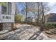 Paver patio and backyard with landscaping and privacy fence at 1301 Merrington Cir, Raleigh, NC 27615
