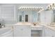 Well-lit bathroom with double sinks, vanity area, lots of storage, and a large mirror at 1301 Merrington Cir, Raleigh, NC 27615