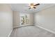 Comfortable bedroom with neutral walls, carpet and a ceiling fan at 1301 Merrington Cir, Raleigh, NC 27615