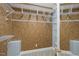 Walk-in closet with white wire shelving and hardwood walls, providing ample storage space at 1301 Merrington Cir, Raleigh, NC 27615