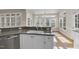 Kitchen island boasting granite countertops, double basin sink and stainless steel dishwasher at 1301 Merrington Cir, Raleigh, NC 27615
