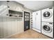 Convenient laundry area with washer, dryer, and storage at 135 Windsor Cir, Chapel Hill, NC 27516