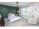 Cozy bedroom featuring a decorative wall, plush rug, and comfortable chair at 140 Ashberry Ln, Franklinton, NC 27525