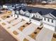 New townhomes with garages, landscaping, and dark roofs in a well-planned community at 164 Kobus Ct, Garner, NC 27529