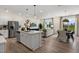 Open-concept living space with a modern kitchen, dining area, and comfortable living room at 168 Kobus Ct, Garner, NC 27529