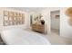 Light and airy main bedroom features a walk-in closet and modern decor at 168 Kobus Ct, Garner, NC 27529
