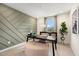 Well lit office with a desk, chair, and decorative plant for an ideal workspace at 168 Kobus Ct, Garner, NC 27529