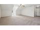 Spacious bonus room offering flexible space for recreation or relaxation, with plush carpeting at 1709 Heisser Ln, Fuquay Varina, NC 27526