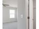 A well-lit bedroom with gray carpet and a walk-in closet just outside the door at 172 Kobus Ct, Garner, NC 27529