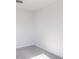 A well-lit bedroom showcasing a light gray carpet and crisp, white walls at 172 Kobus Ct, Garner, NC 27529