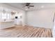 Open concept living space with hardwood floors connecting kitchen and staircase at 172 Kobus Ct, Garner, NC 27529