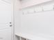 Well-organized mudroom area with hooks, bench, and storage for convenience at 172 Kobus Ct, Garner, NC 27529