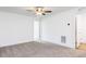 Spacious bedroom with a ceiling fan, carpeted floors, and white trim at 18 Twin Birch Dr, Angier, NC 27501