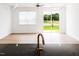 Open living space featuring hardwood floors, and slider glass door at 18 Twin Birch Dr, Angier, NC 27501
