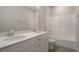 Bathroom features a double sink vanity, modern fixtures, and a shower-tub combination at 1805 Bright Lantern Way, Wendell, NC 27591