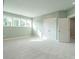 Bright bedroom with multiple windows and a closet with double doors at 1805 Bright Lantern Way, Wendell, NC 27591