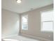 Well-lit bedroom featuring a neutral color palette and large windows at 1805 Bright Lantern Way, Wendell, NC 27591