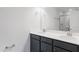 Modern primary bathroom with dual sinks, quartz countertops, and walk-in shower at 1917 Fishamble St, Fuquay Varina, NC 27526
