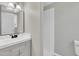 Bathroom features a vanity with a white countertop and modern fixtures at 2080 Saint Paul Church Rd, Roxboro, NC 27574