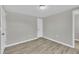 This is an interior image of a simple bedroom with light-colored walls at 2080 Saint Paul Church Rd, Roxboro, NC 27574