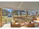 Cozy covered porch with comfortable seating, offering a relaxing outdoor space with scenic views at 2080 Saint Paul Church Rd, Roxboro, NC 27574