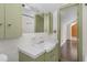 Bathroom featuring a white vanity with olive-green cabinets, with vintage style at 2120 Cokey Rd, Rocky Mount, NC 27801