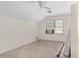 Bedroom featuring white walls, neutral carpet, a ceiling fan, and a window with blinds for natural light at 2120 Cokey Rd, Rocky Mount, NC 27801