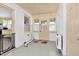 Mud room features white painted brick and trim, and multiple windows with shutters at 2120 Cokey Rd, Rocky Mount, NC 27801