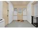 Mud room features white painted brick and trim, and a windowed door with shutters at 2120 Cokey Rd, Rocky Mount, NC 27801
