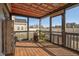 Cozy screened patio with wood deck, and a sign reading 'The Gathering Place' at 2120 Cokey Rd, Rocky Mount, NC 27801