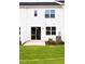 Backyard featuring a concrete patio and green grass at 22 Twin Birch Dr, Angier, NC 27501