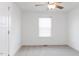 Bedroom featuring a ceiling fan, natural light, and neutral carpet at 22 Twin Birch Dr, Angier, NC 27501