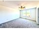A well-lit bedroom features a large window, neutral carpet, and fresh white walls at 22 Twin Birch Dr, Angier, NC 27501