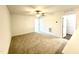 A bright, spacious bedroom features neutral carpet, white walls, and a modern ceiling fan at 22 Twin Birch Dr, Angier, NC 27501