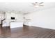 Open-concept living space features wood-look floors, recessed lighting, and a kitchen with a center island at 22 Twin Birch Dr, Angier, NC 27501