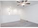 Carpeted loft with a ceiling fan and natural light; perfect for a playroom or home office at 22 Twin Birch Dr, Angier, NC 27501